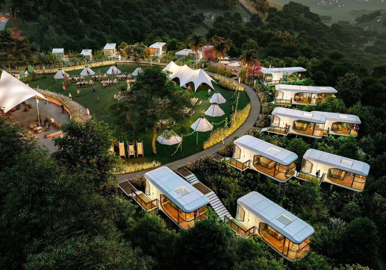 Manufacturer-supplied concept render showing multiple modular units arranged around a landscaped site